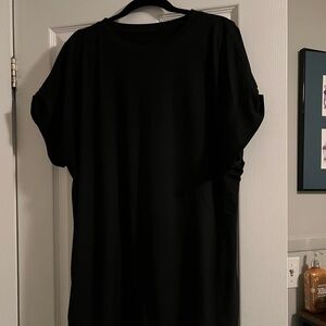 Black t-shirt dress

Smoke and pet free home. 
Never worn